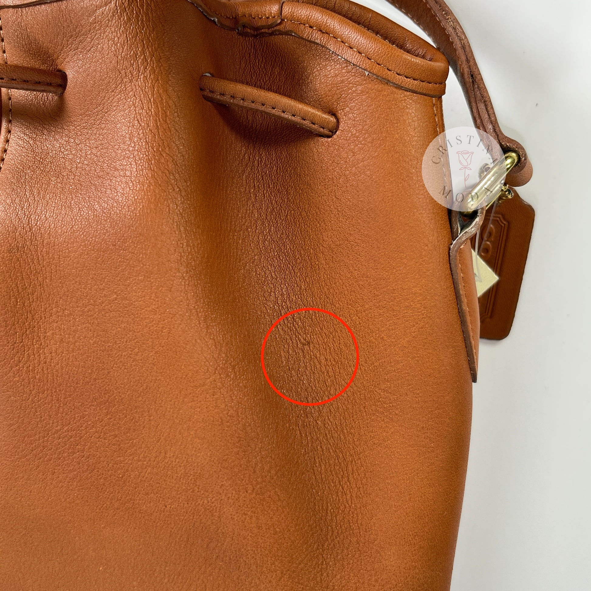 Close-up photo of a faint mark on the front of the bag. 