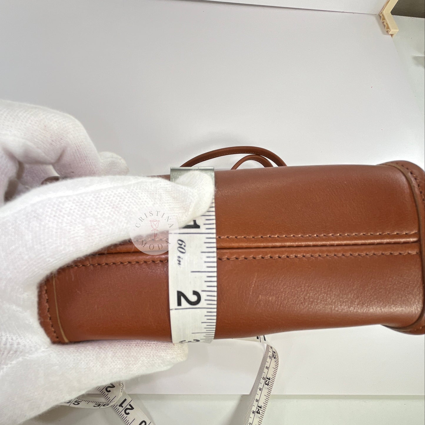 Vintage Coach Scooter Bag in British Tan, view of measuring tape showing depth measurement