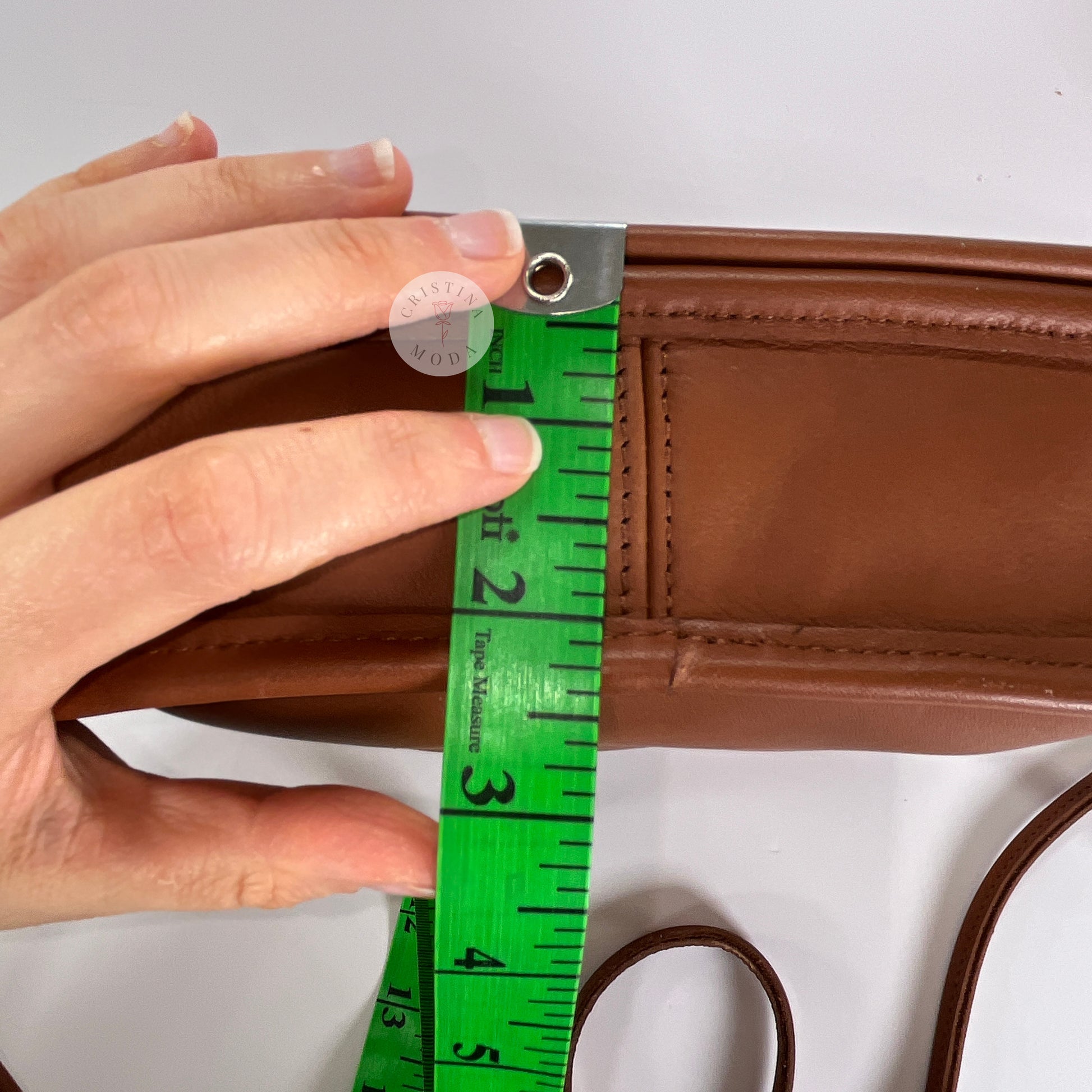 Photo showing measurement of the bottom of the bag