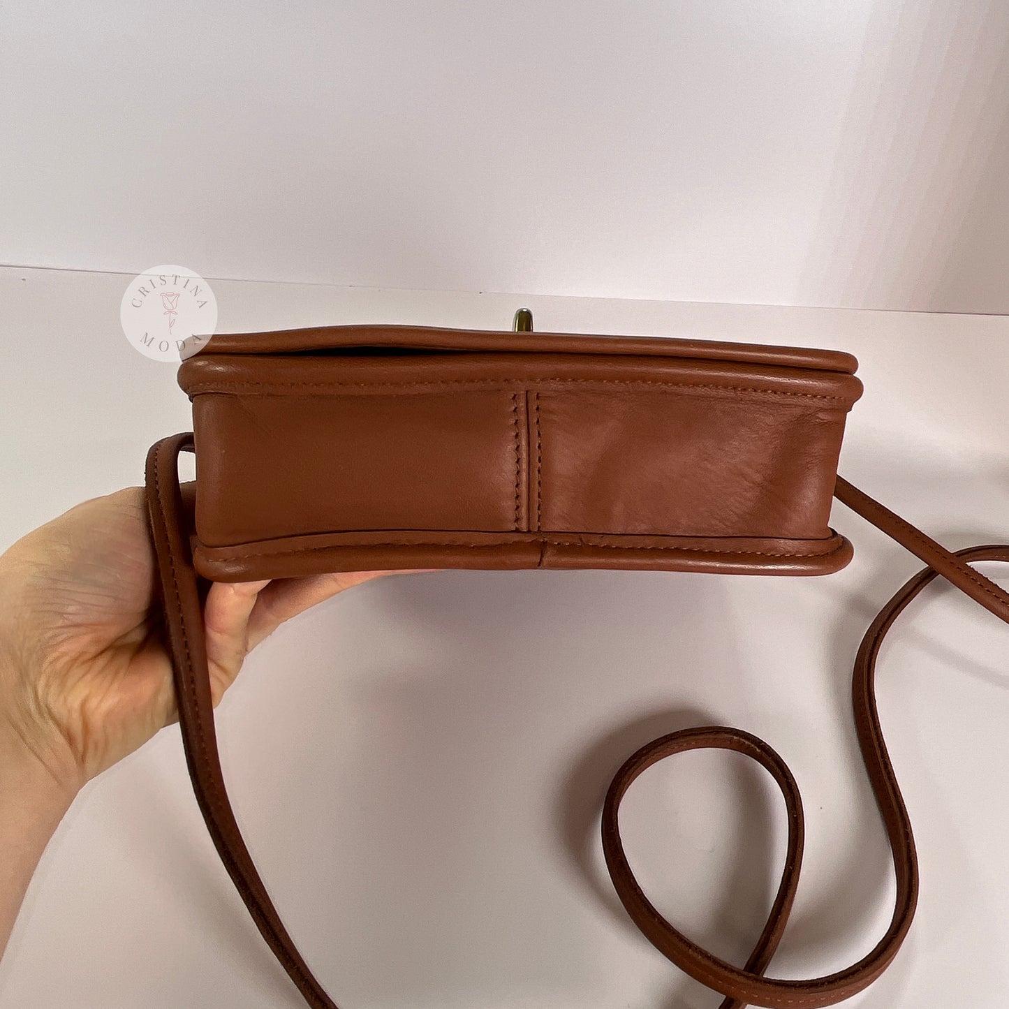 Bottom of vintage coach compact pouch