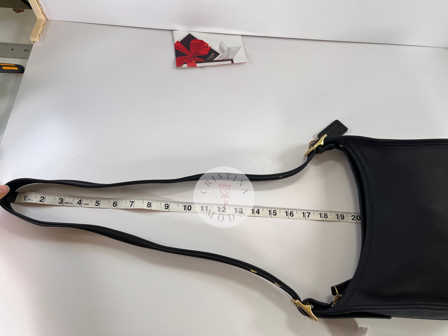 Photo with measuring tape showing strap drop measurement