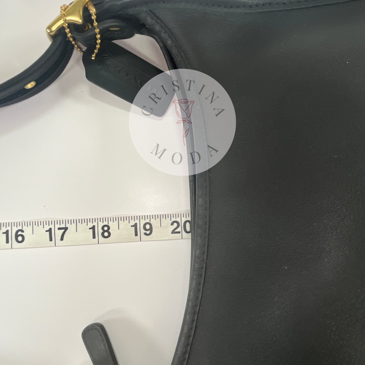 Close up photo with measuring tape showing strap drop measurement