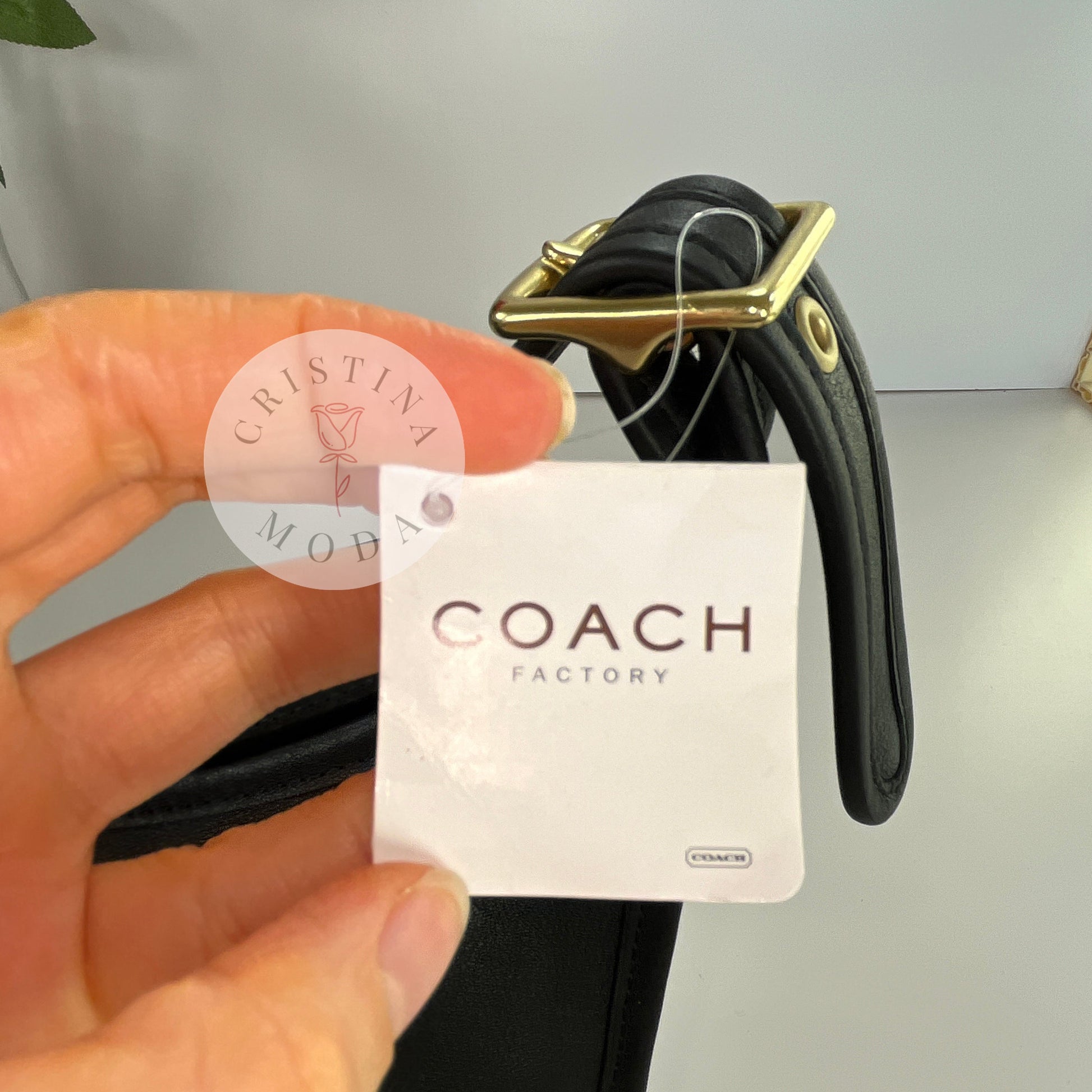 Close up photo of outside of price tag attached to bag