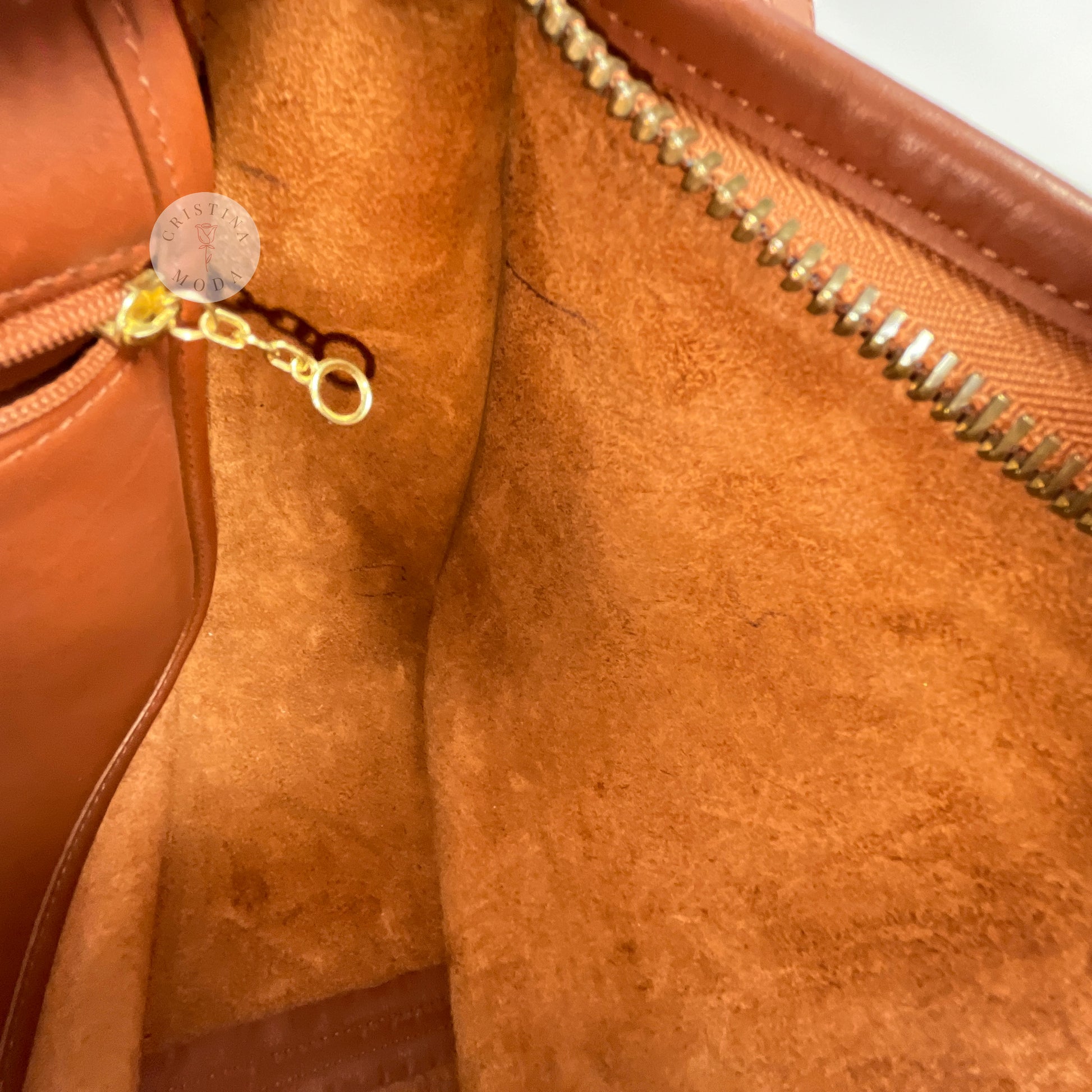 Close up showing area with pen marks inside of vintage coach Patricia's Legacy Bag in British Tan