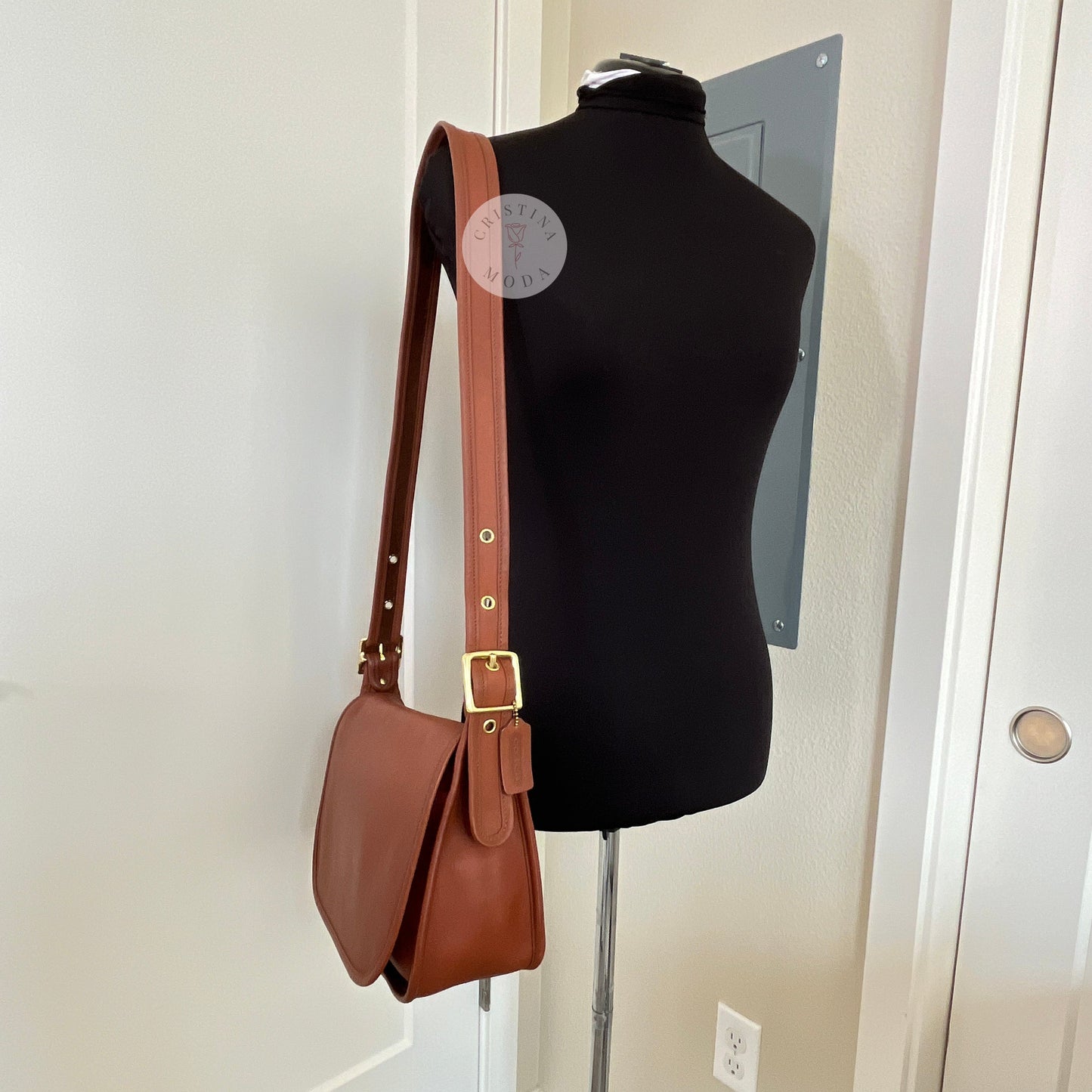 View of vintage coach Patricia's Legacy Bag in British Tan on mannequin