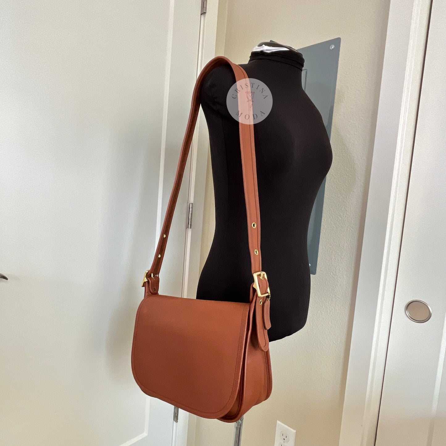 View of vintage coach Patricia's Legacy Bag in British Tan on mannequin