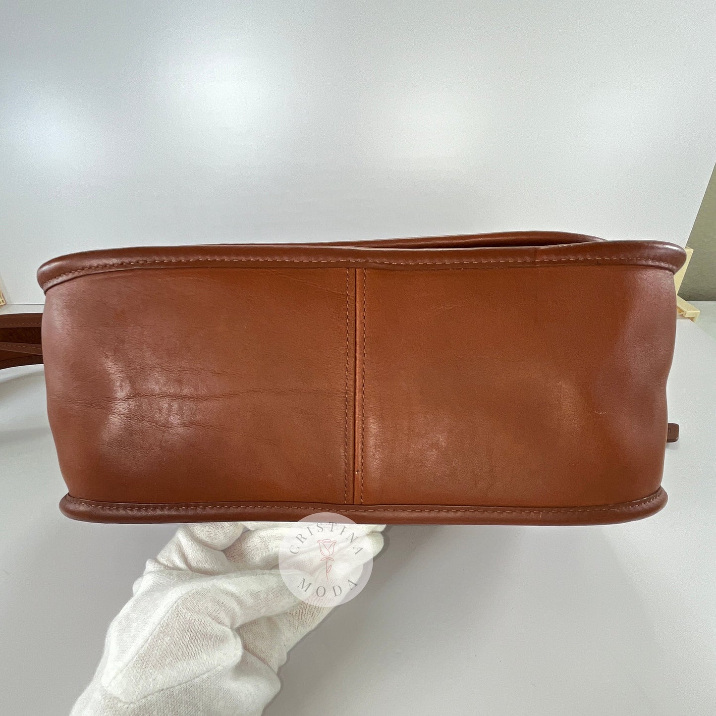 View of bottom of vintage coach Patricia's Legacy Bag in British Tan