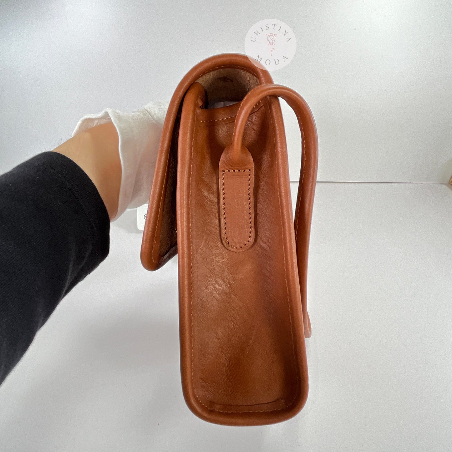 Side view of the British Tan vintage Coach Scooter Bag