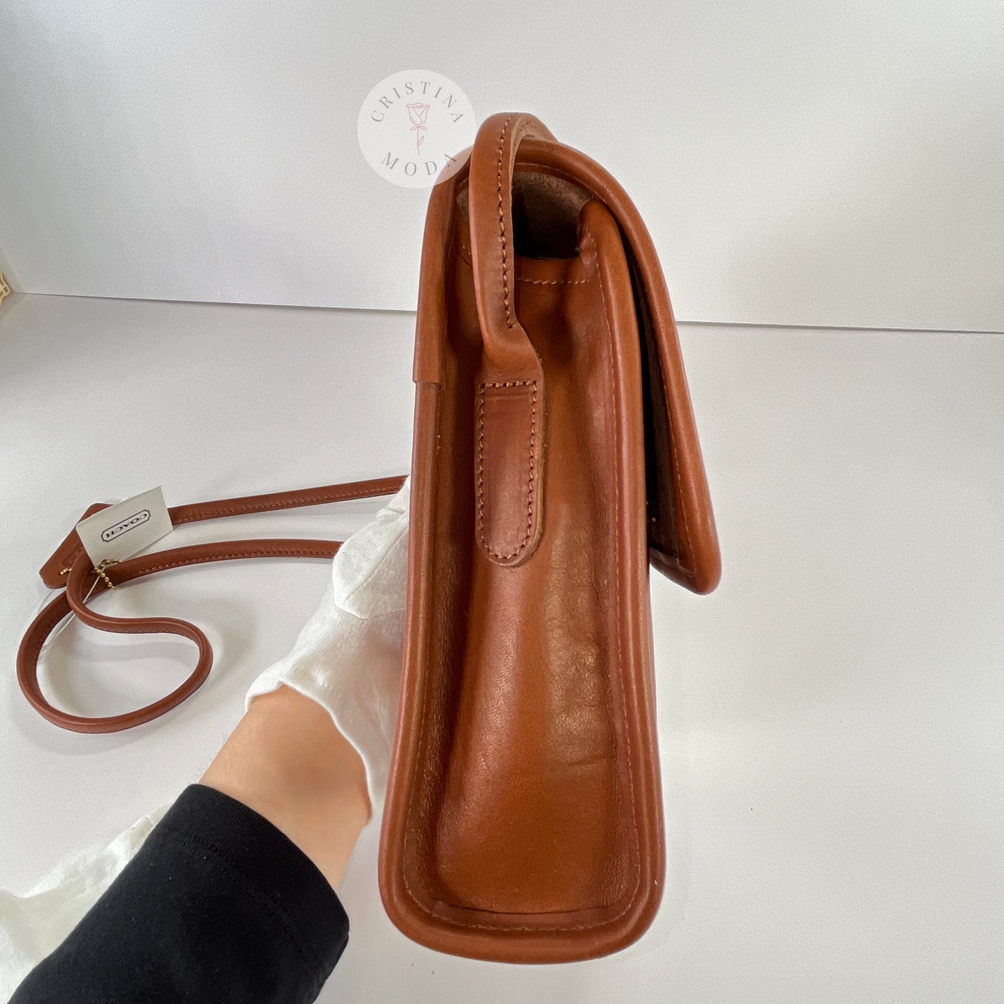 Side view of the British Tan vintage Coach Scooter Bag