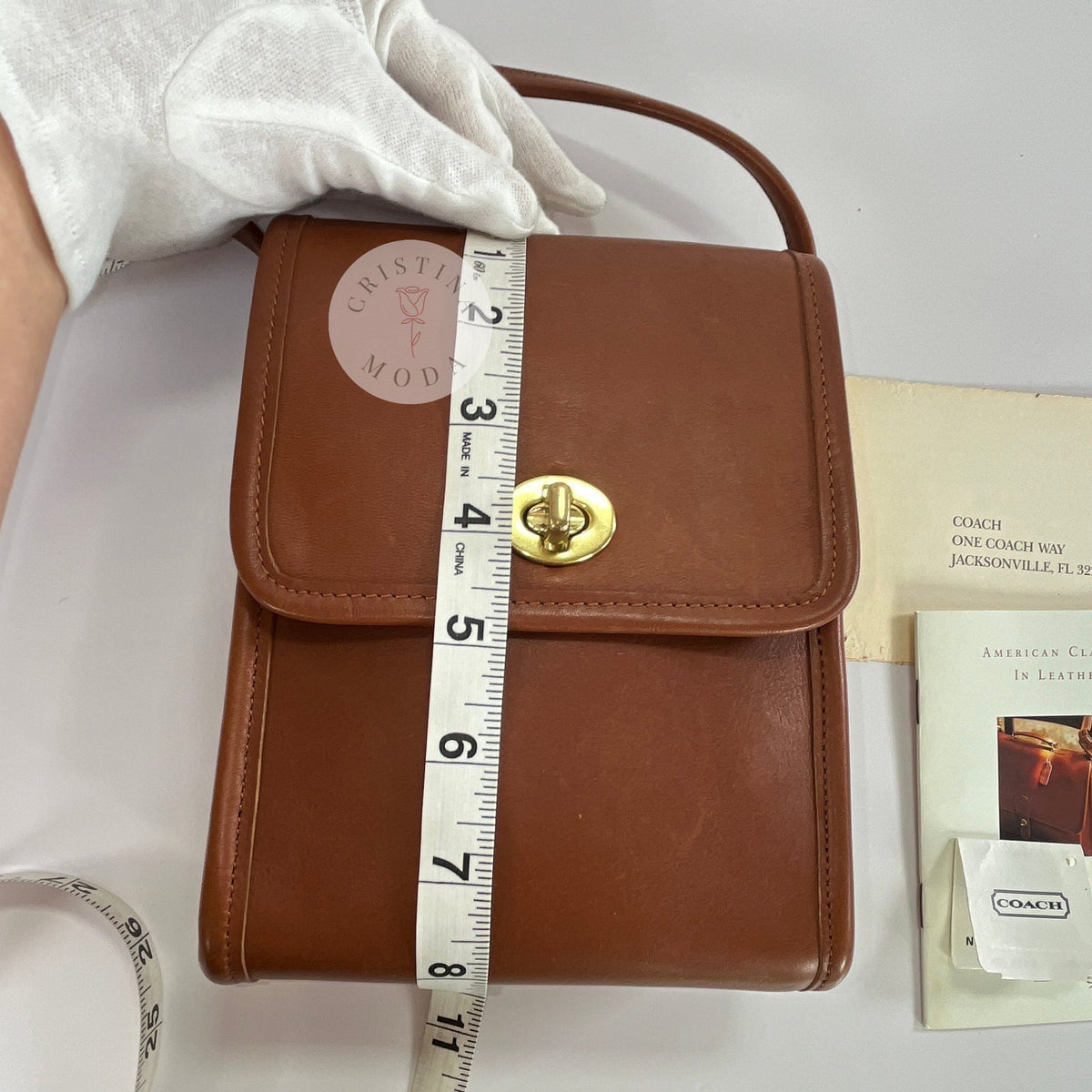 Vintage Coach Scooter bag in British Tan leather with measuring tape showing height measurement