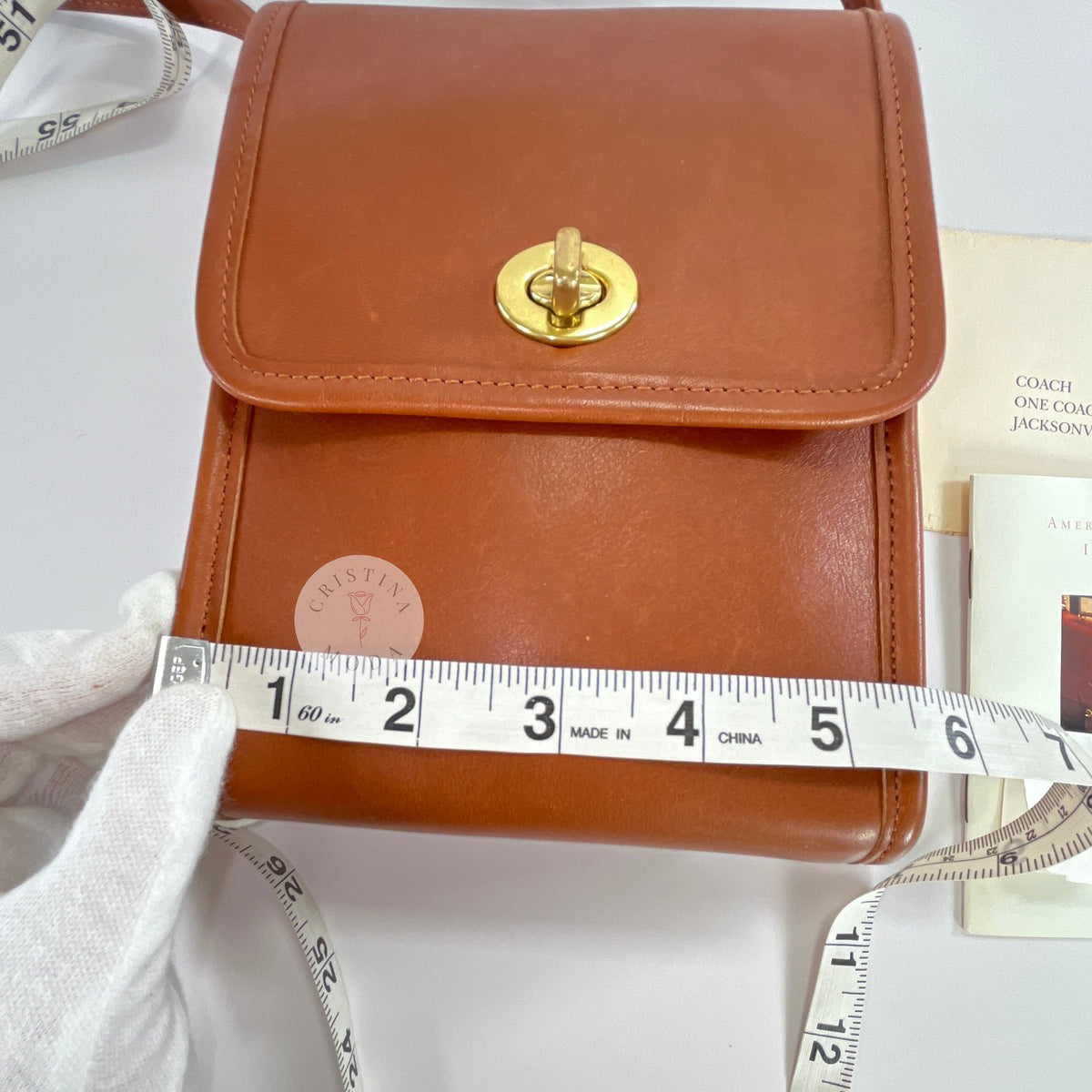 Vintage Coach Scooter bag in British Tan leather with measuring tape showing width measurement