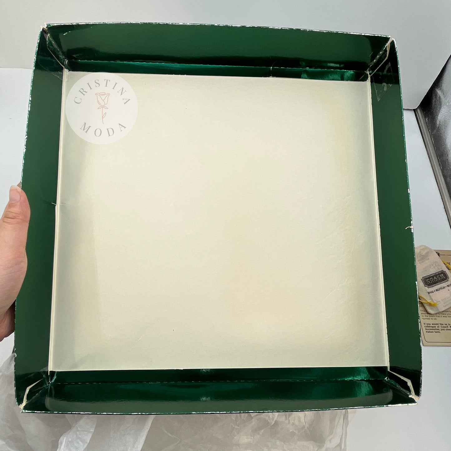 Photo of the inside of the lid of the box that comes with the bag