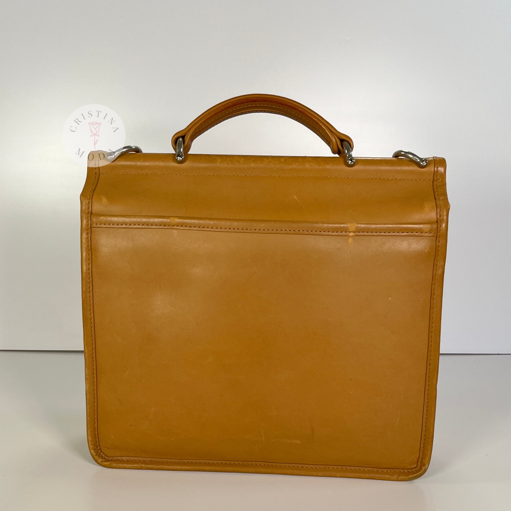 image showing back of willis bag in camel colored leather