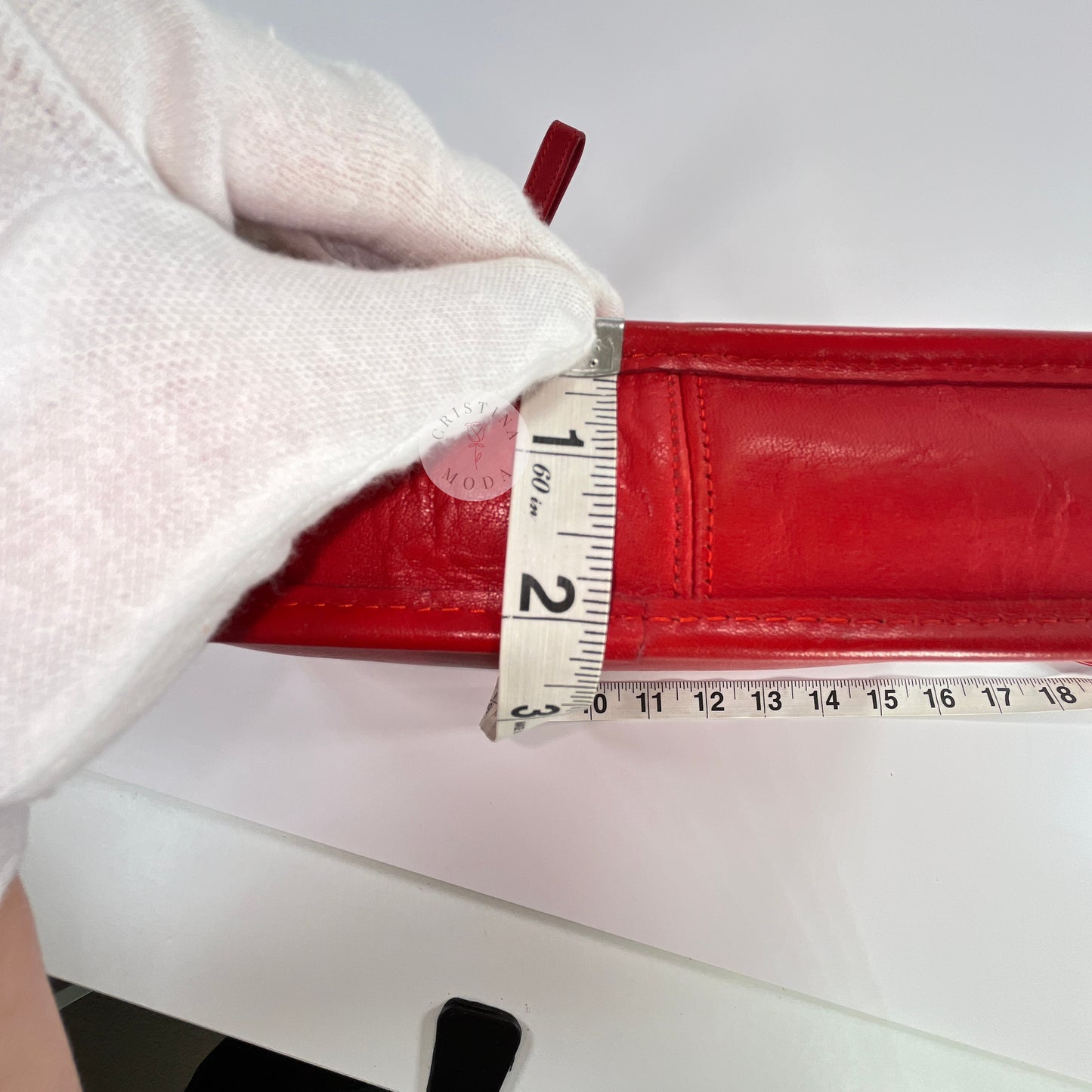 Vintage Coach Zippered Clutch in Red, view of measuring tape showing depth measurement