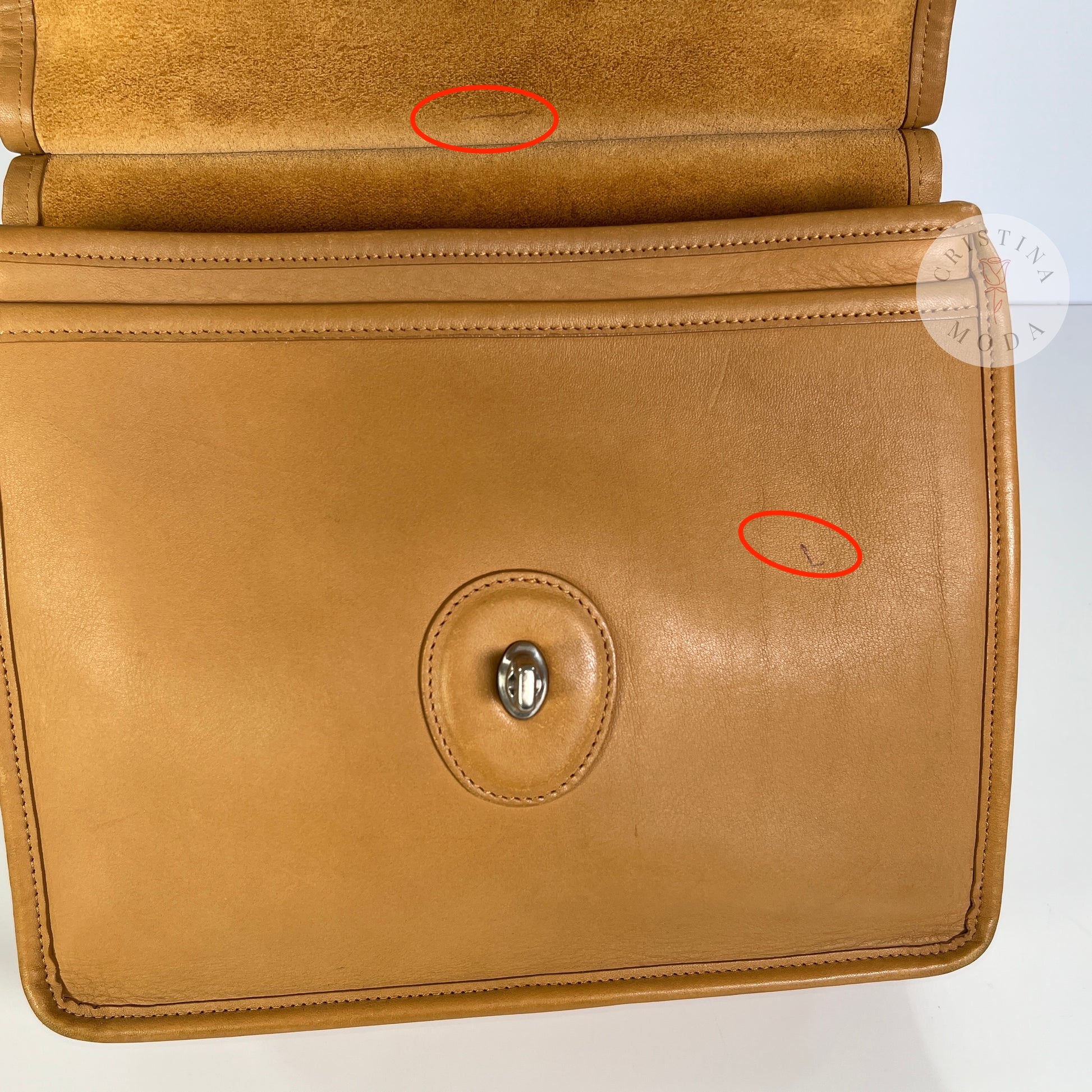 image showing close up of pen marks under the front flap area of the bag