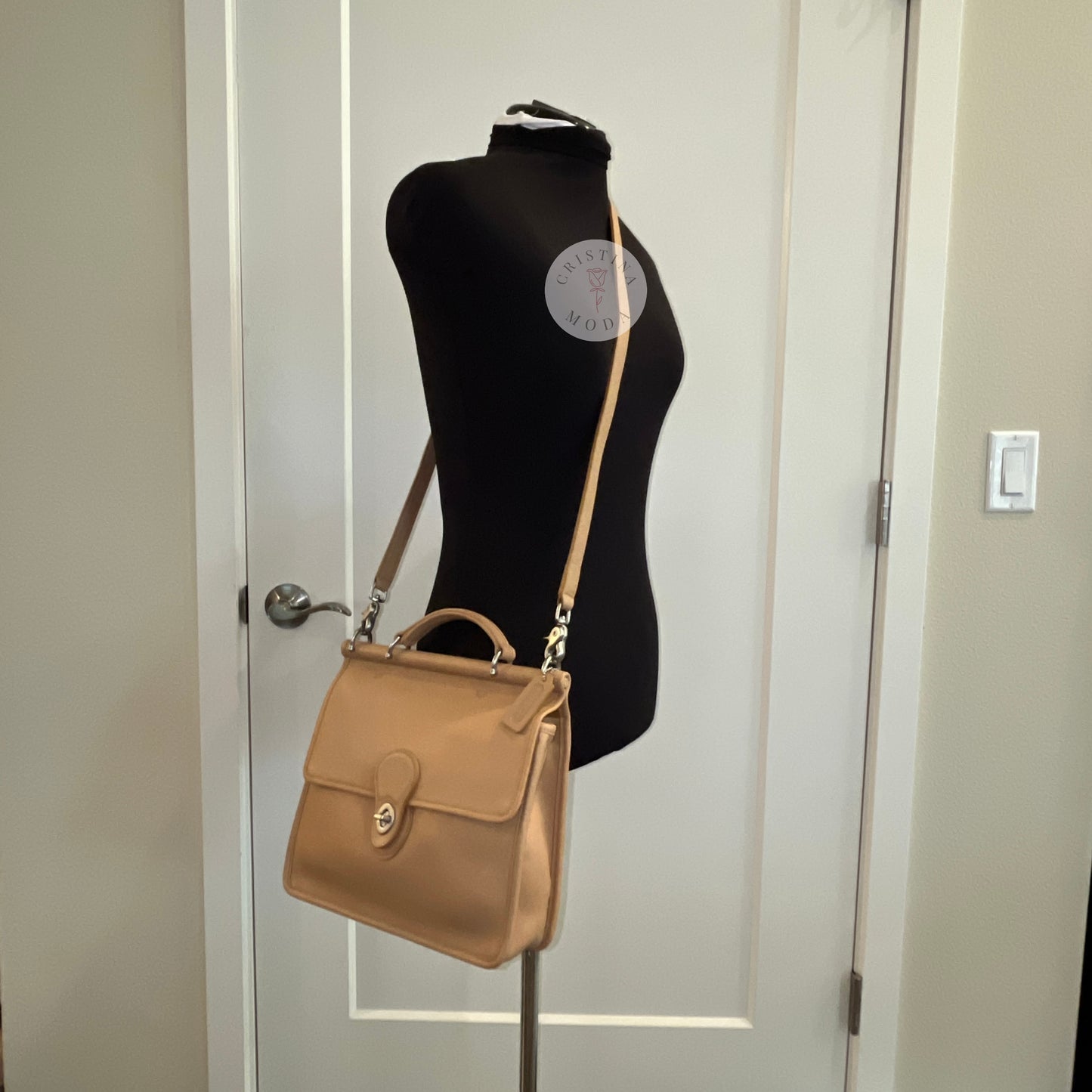vintage coach willis bag in Camel colored leather- photo of bag on a mannequin