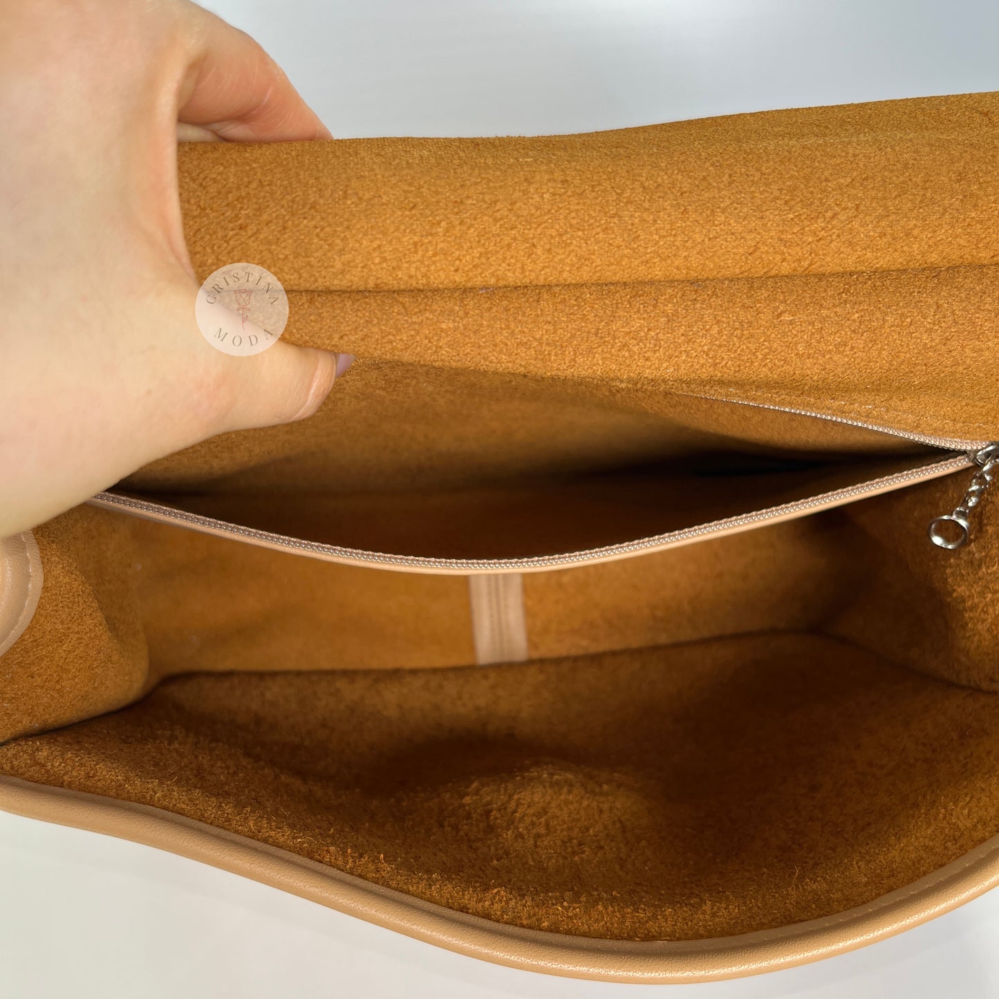 Photo showing the inside zip pocket